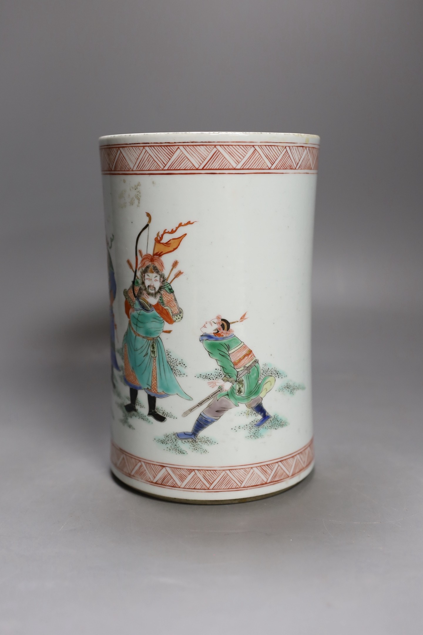 A Chinese famille verte brush pot, 19.5 cms high.